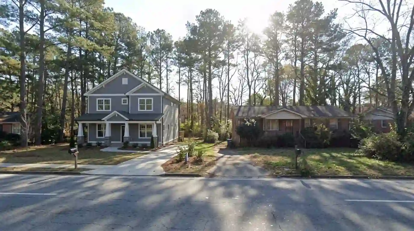 Craftsman-style infill home with new gray siding in Brookhaven