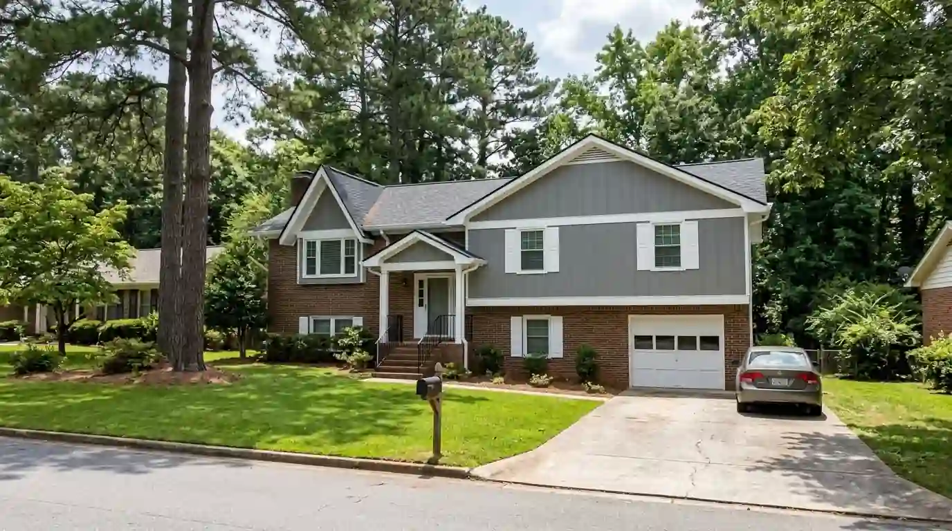 Brick split-level house with fresh white trim in Tucker