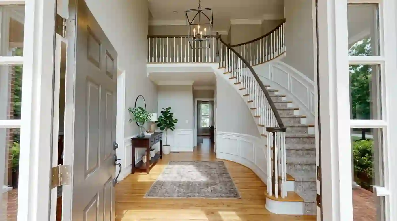 Two-story foyer with fresh paint in a Johns Creek home