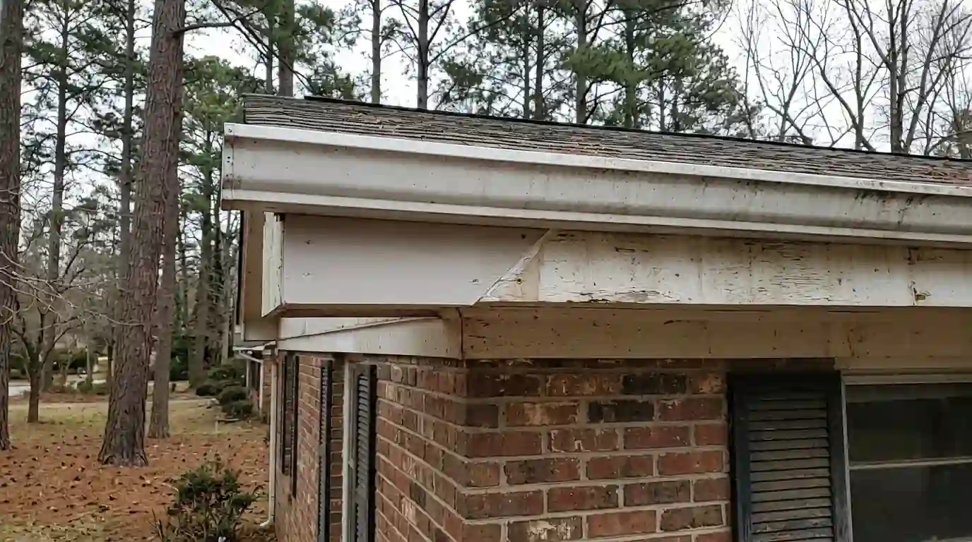 New primed fascia board scarfed in under a gutter