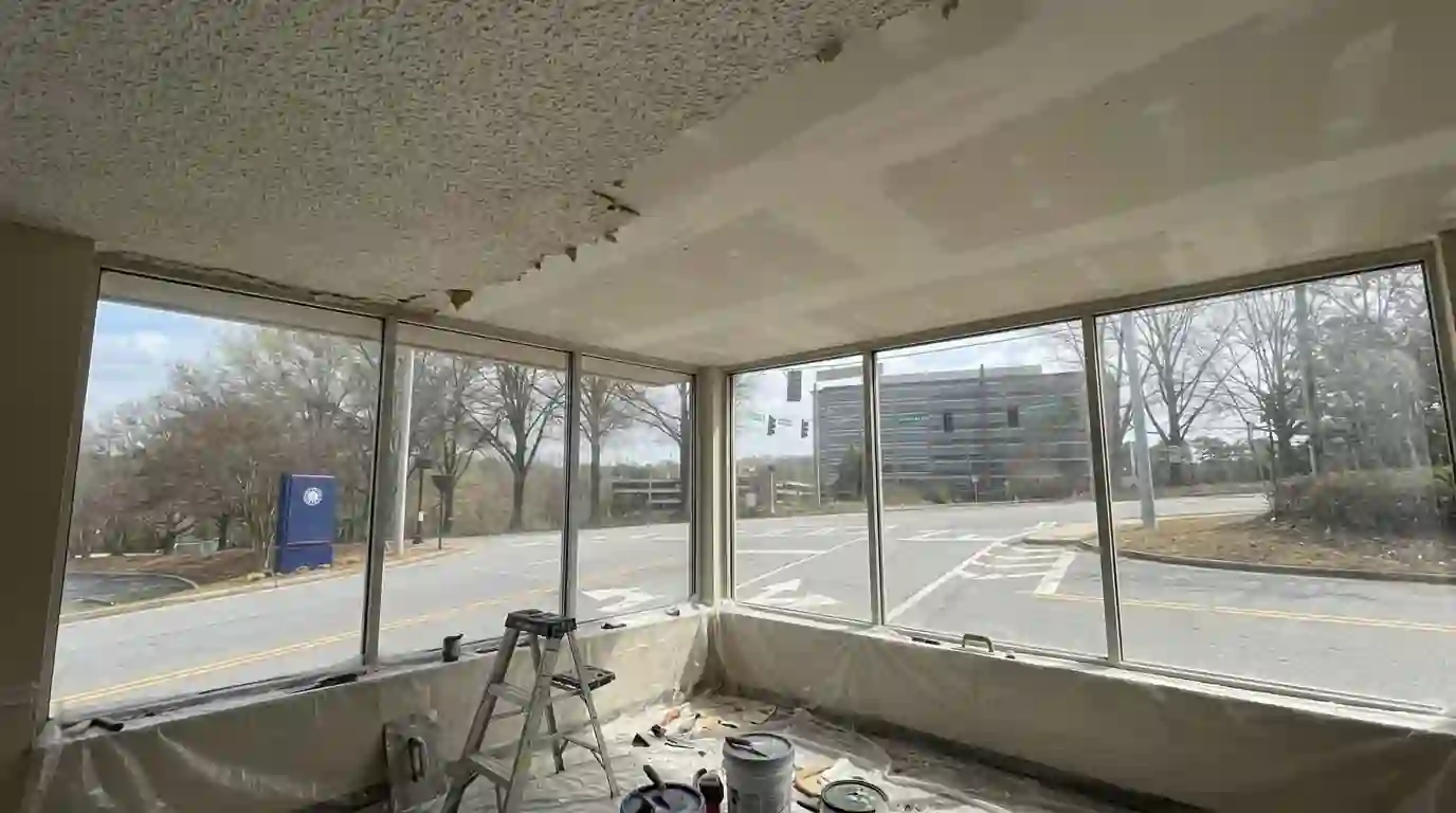 Ceiling half scraped, half skimmed smooth